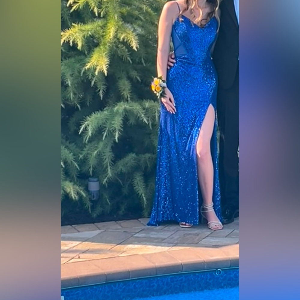 camille la vie

Prom dress blue size 6.  Person wearing is 5’8